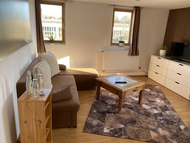 Wohnzimmer von Wohnung 1